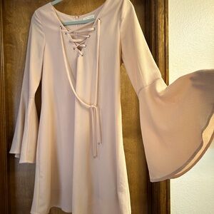 Blush mid flow dress with boho sleeves. Brand is Vestique. Size small.